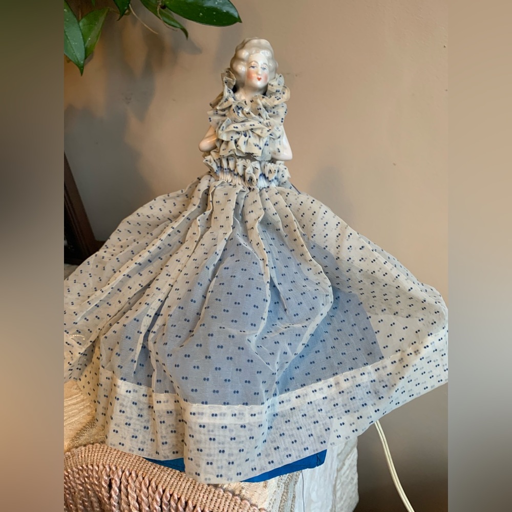Antique Boudoir Victorian lamp with lighted skirt.